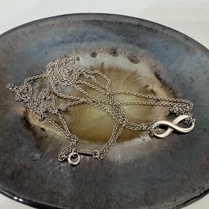 Tiffany & Co. Elegant Silver Infinity Necklace